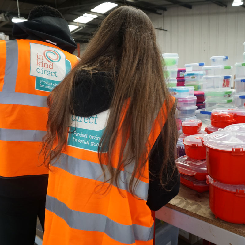 two people in orange high vis shirts